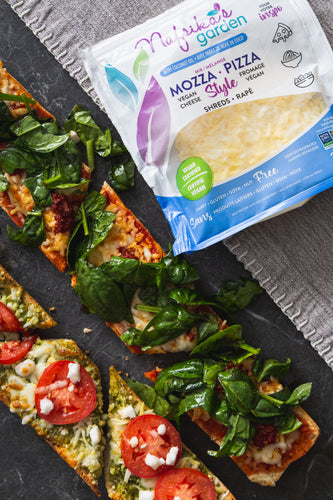 Mediterranean Fusion Delight: Pesto Pizza Baguette with Spinach Salad